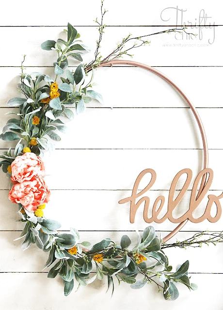 I never would have guessed that this is a hula hoop wreath. There are so many amazing spring wreath ideas in this post, but I think this might be my favorite. (from Thrifty and Chic)