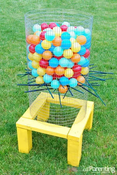 DIY giant Kerplunk game for the backyard