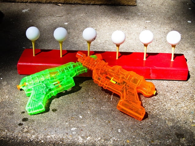 water guns and ping pong targets