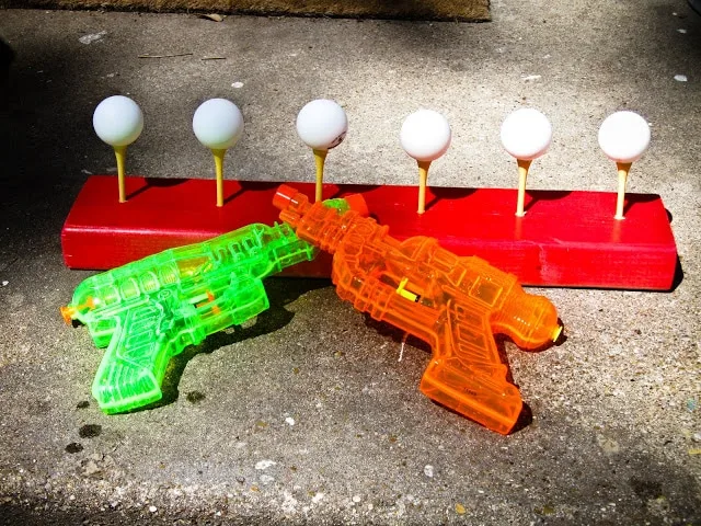 water guns and ping pong targets