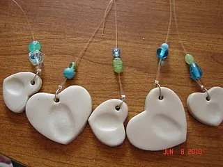 DIY clay fingerprint pendant for homemade Mother's Day gift (from A Girl and a Gluegun).