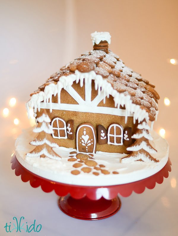 This is a template for making a sweet gingerbread house from scratch. Make a bunch of these and use for a gingerbread decorating party.
