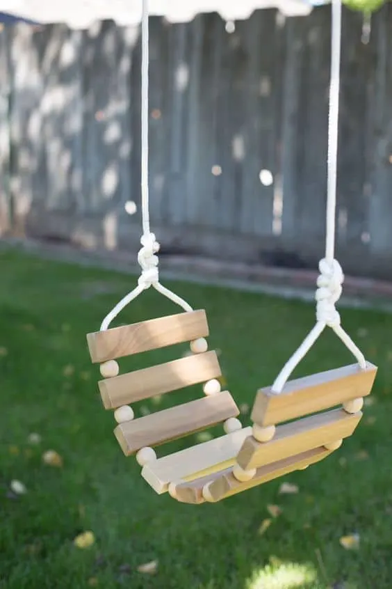 Genius ideas for kids backyard play spaces, incuding this wooden swing tutorial for your kids outdoor play space (via Momtastic). 