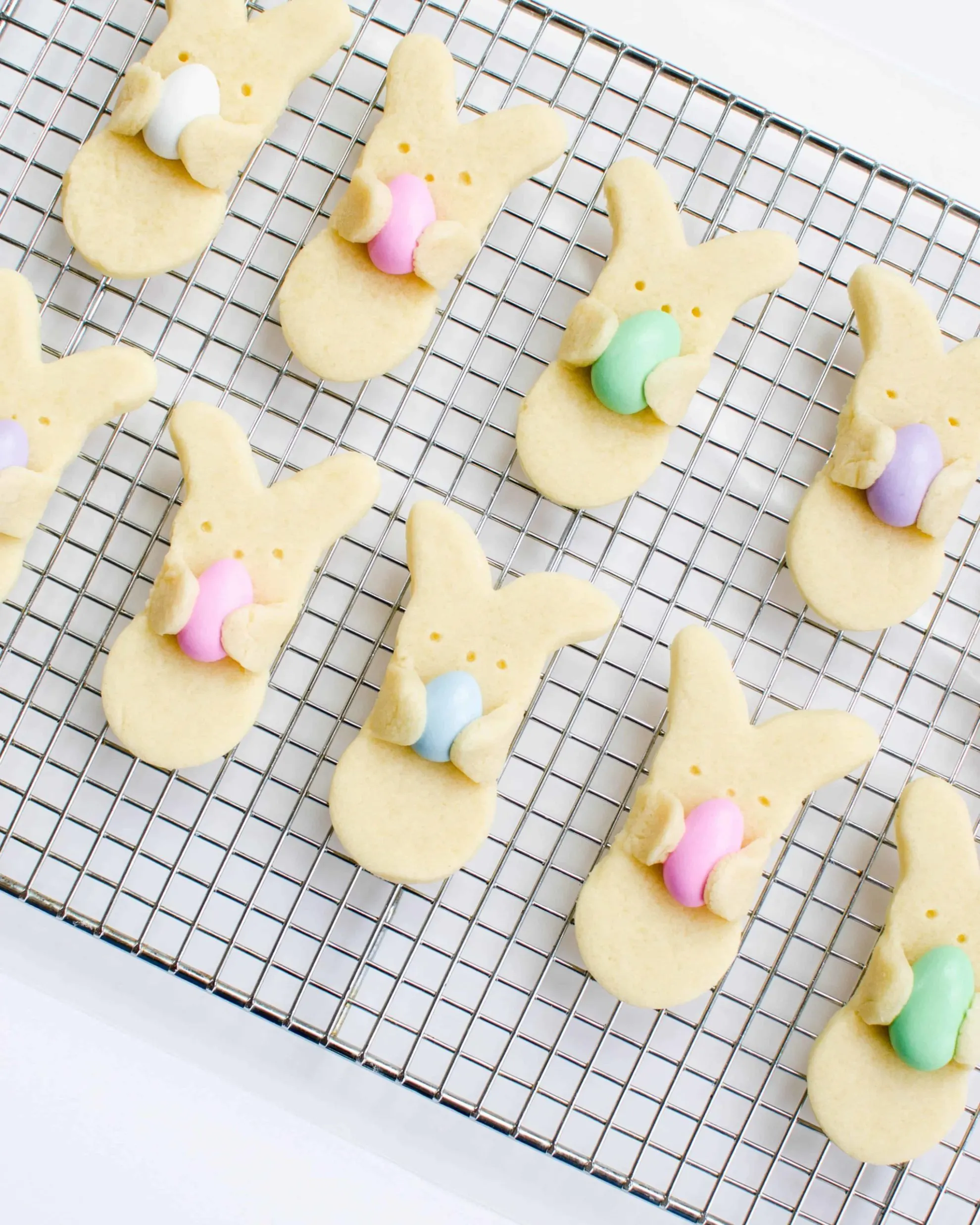 cute bunny hug cookies on cooling rack