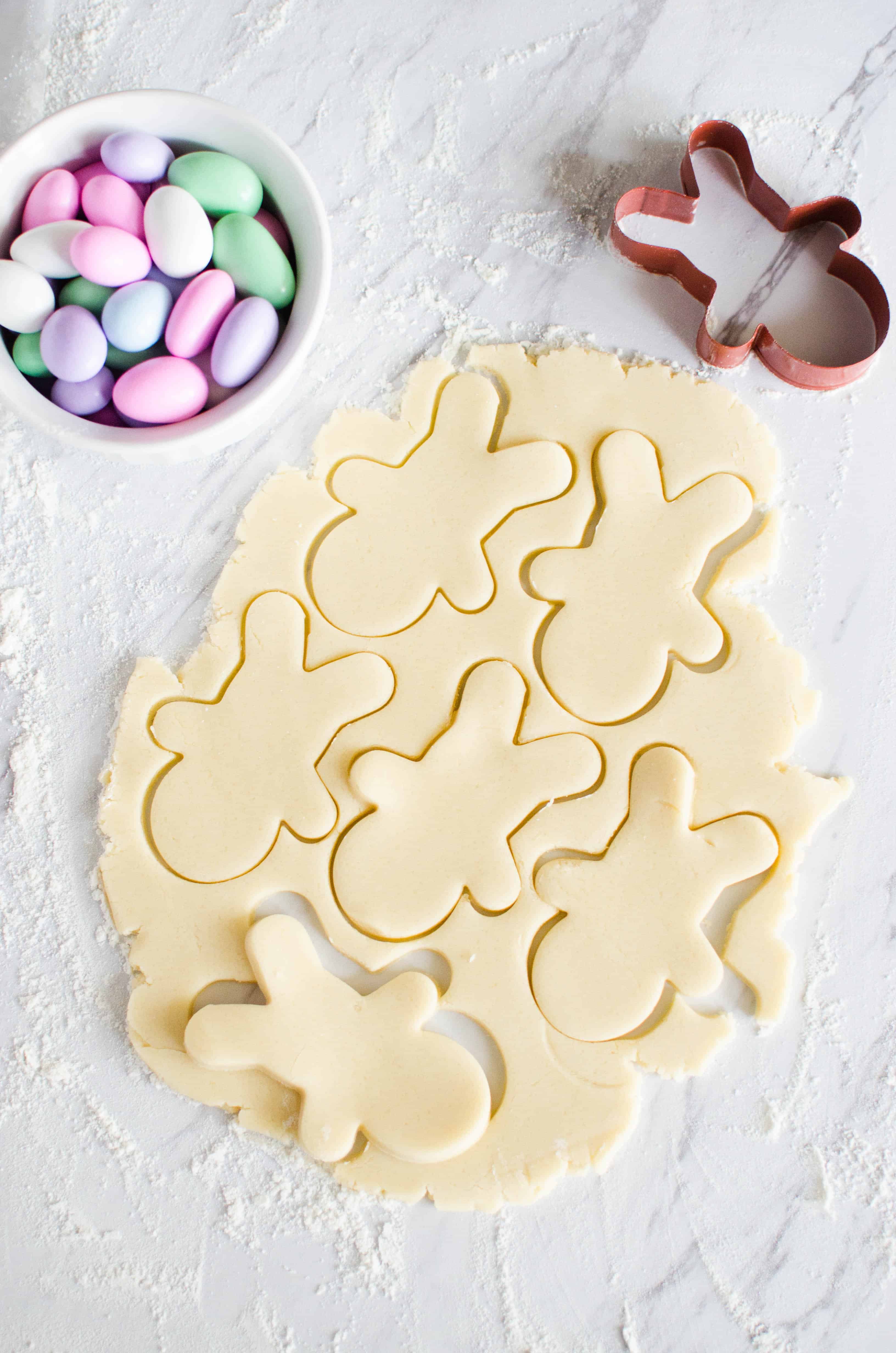 Sugar cookie dough with bunny shaped cutouts