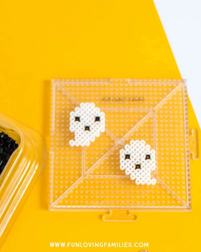 Mini perler bead ghost design. See the whole tutorial to make your own Perler Bead earrings.