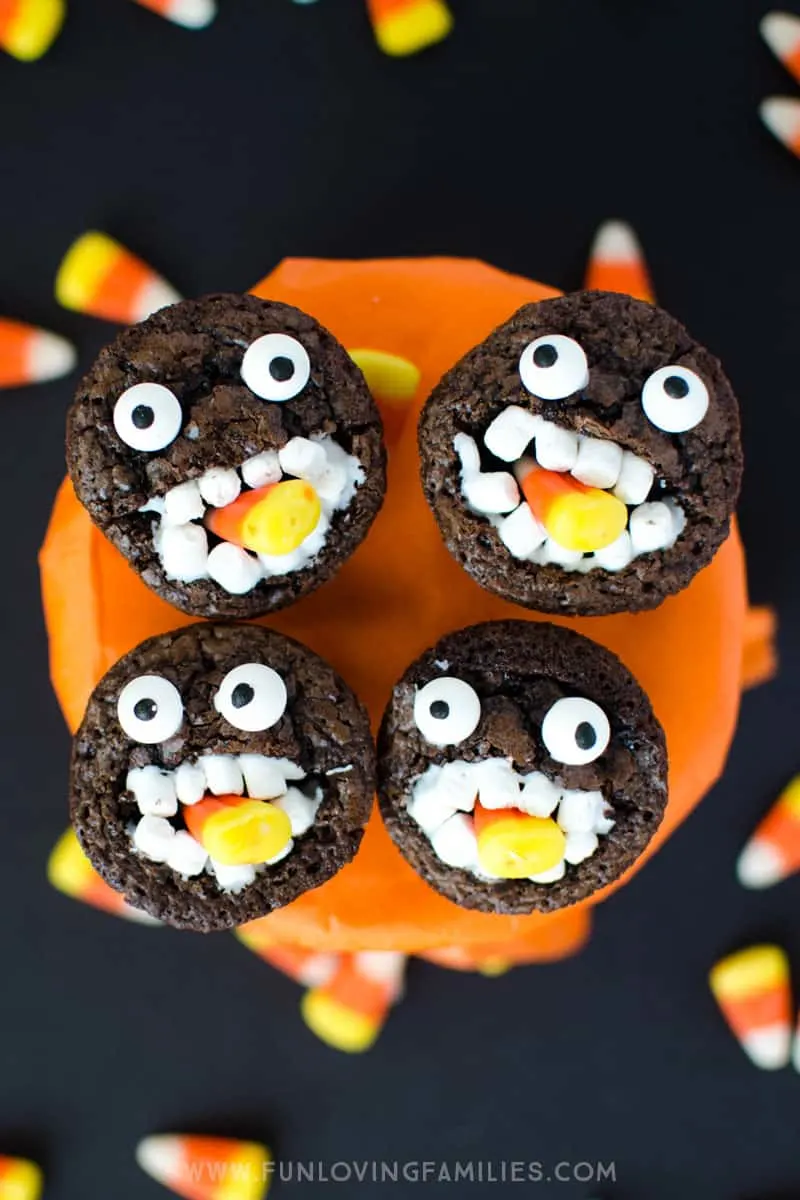 Halloween brownies: Make these adorable brownie candy corn monsters for school parties, or a fun Halloween treat for the kids. #halloween #brownies #funfood #halloweentreats #monster #monsterbrownies #funlovingfamilies