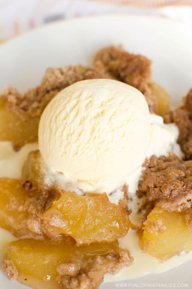 apple spice dump cake with ice cream on top