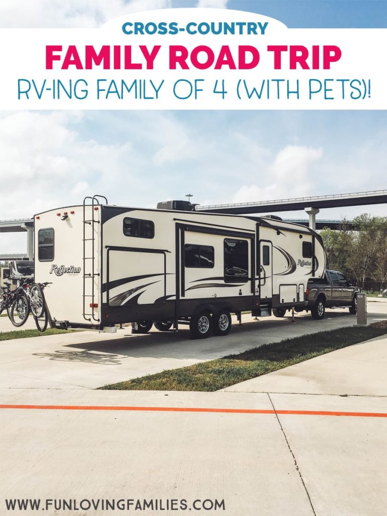 Reflection fifth wheel travel trailer parked at RV park.