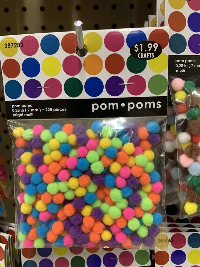 pack of multi colored mini pom poms