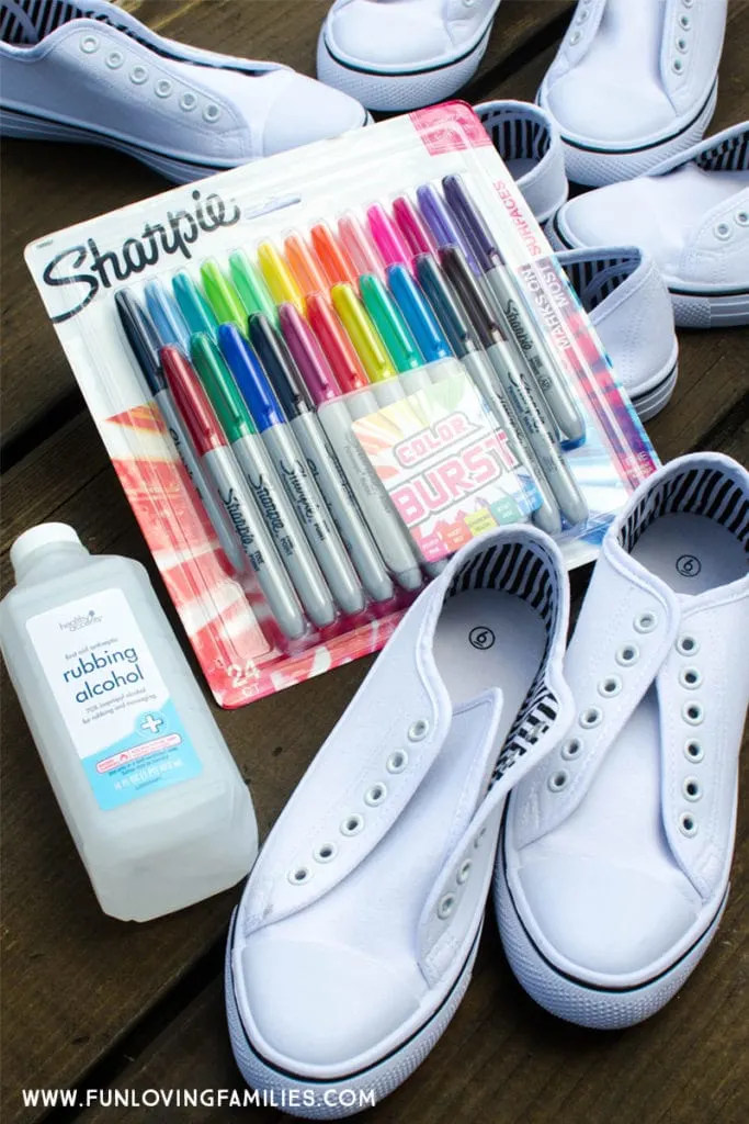supplies for dying shoes with sharpie: white shoes, rubbing alcohol, sharpie markers
