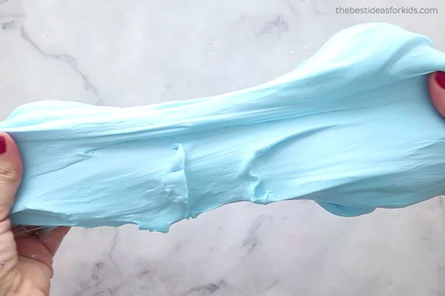 blue fluffy slime being stretched