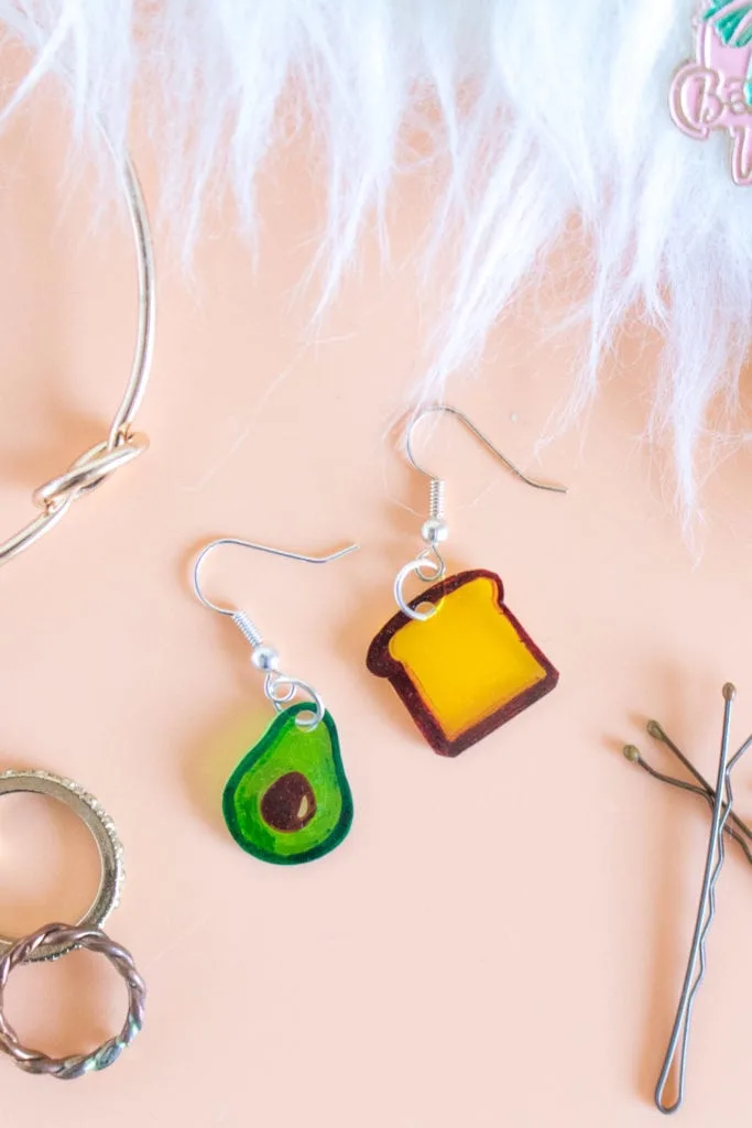 shrink plastic earrings shaped like an avocado and toast craft for tweens and teens
