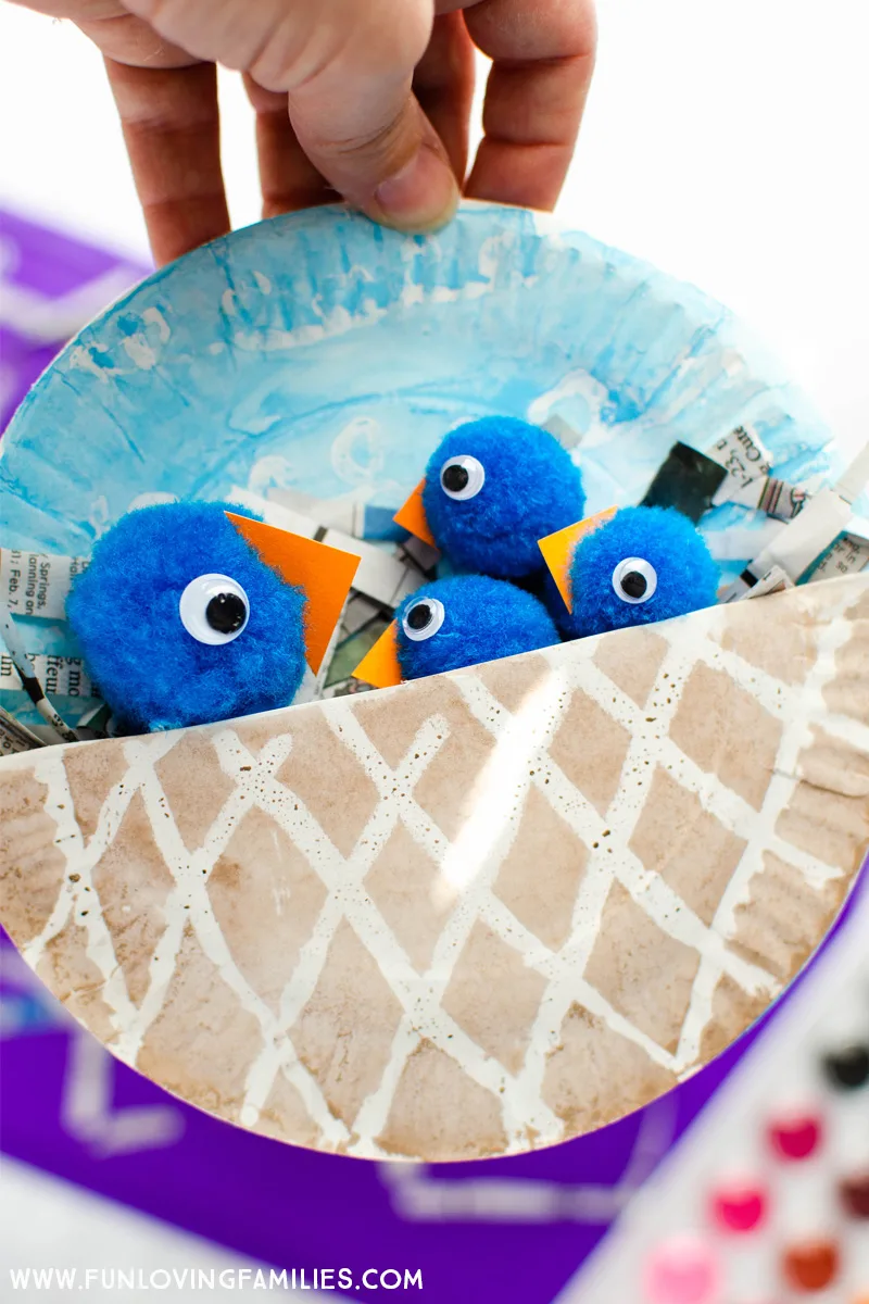 pom pom blue birds in paper plate painted nest