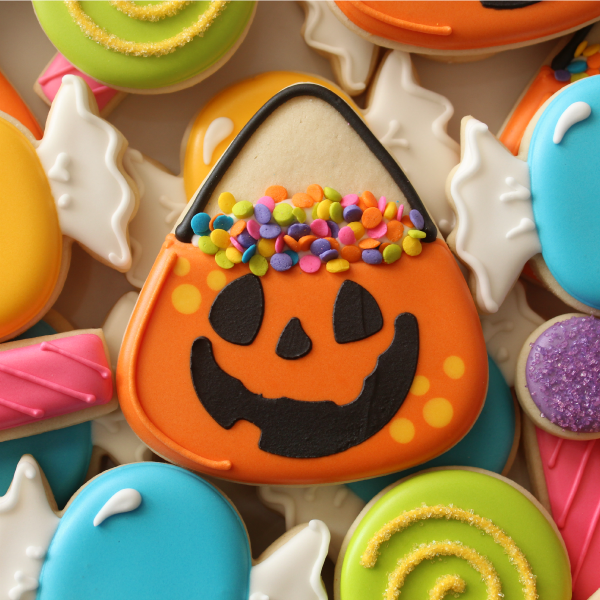 iced sugar cookie with candy bucket decoration