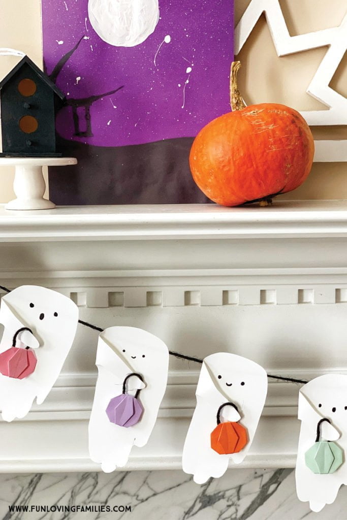 handprint ghost garland on mantel