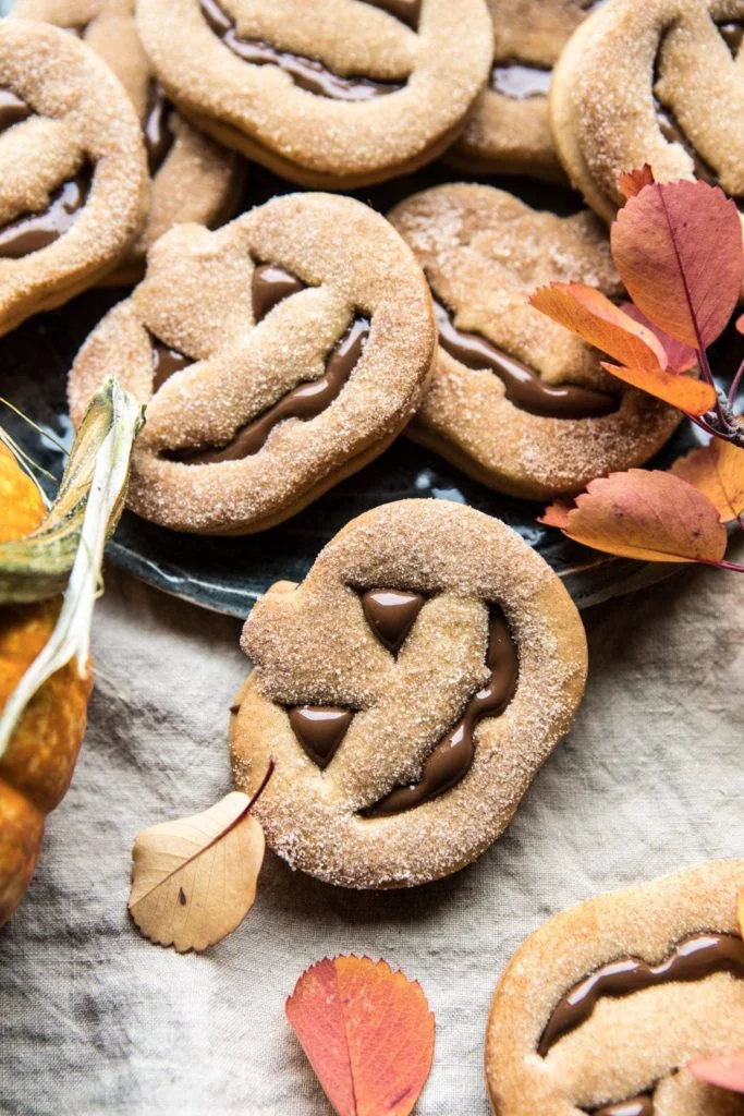 plate of jack o lantern sandwich cookies