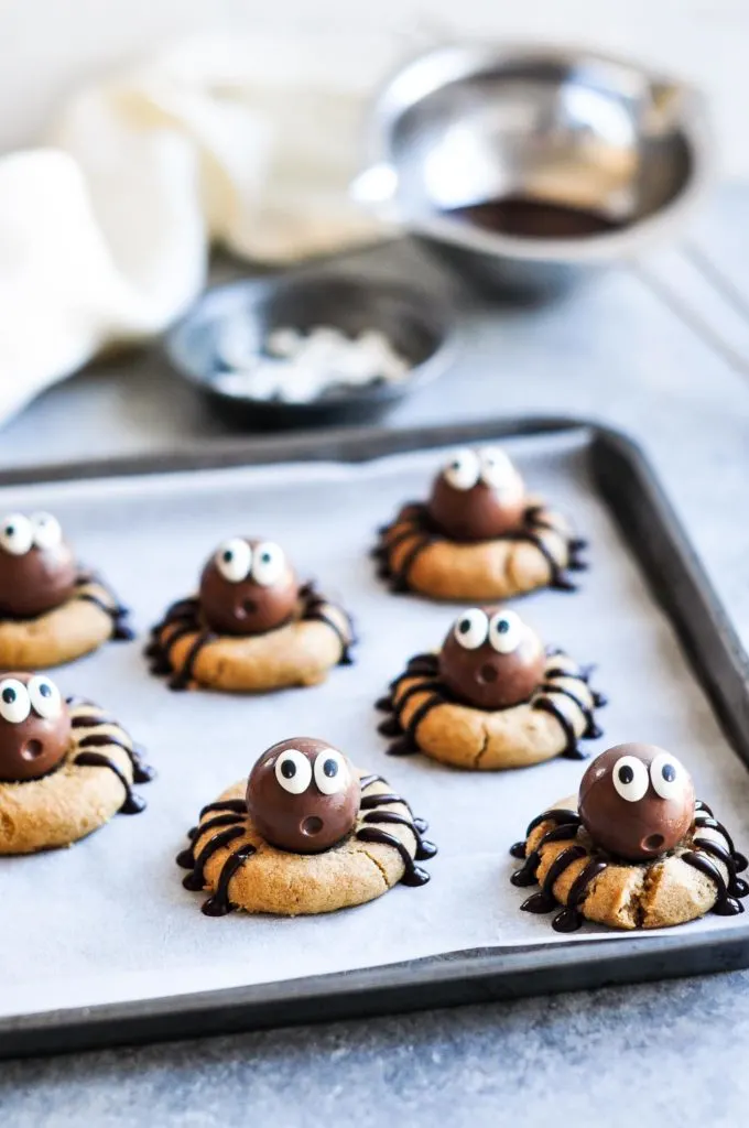 cookie sheet with peanut butter spider cookies