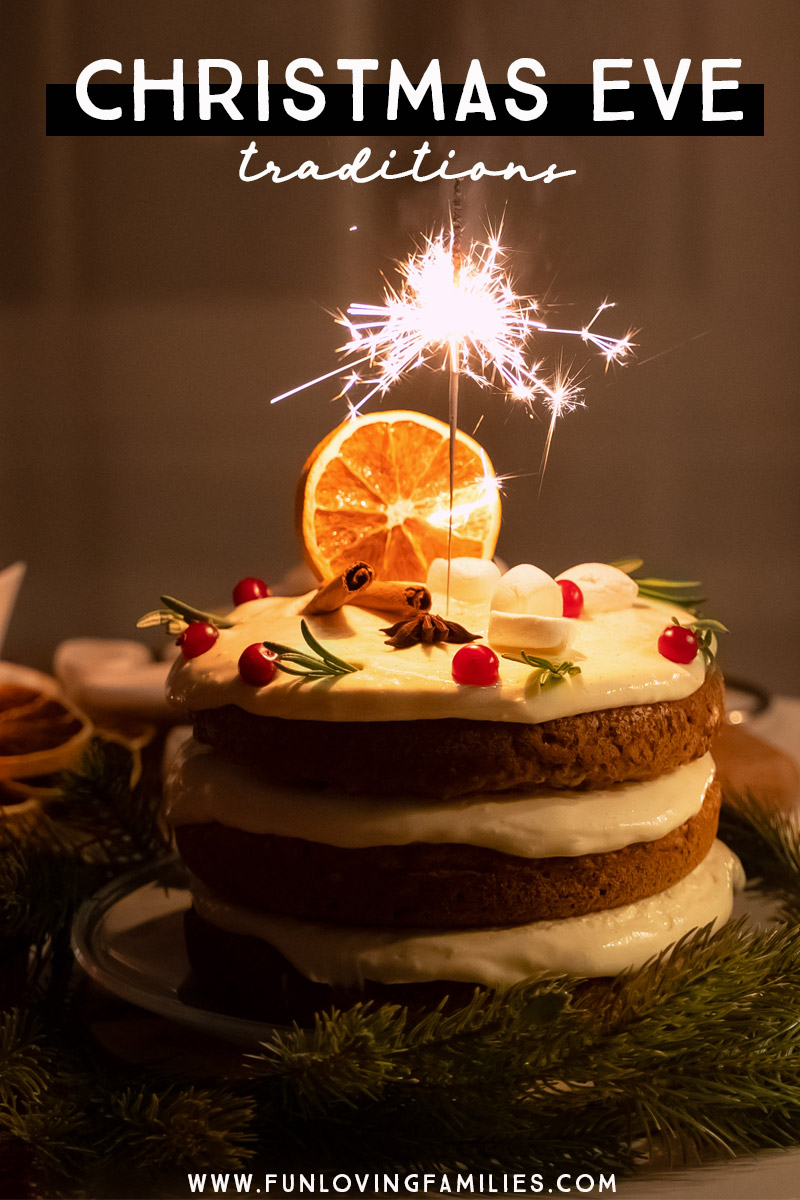 Christmas Eve traditions with festive layered holiday cake and sparkler