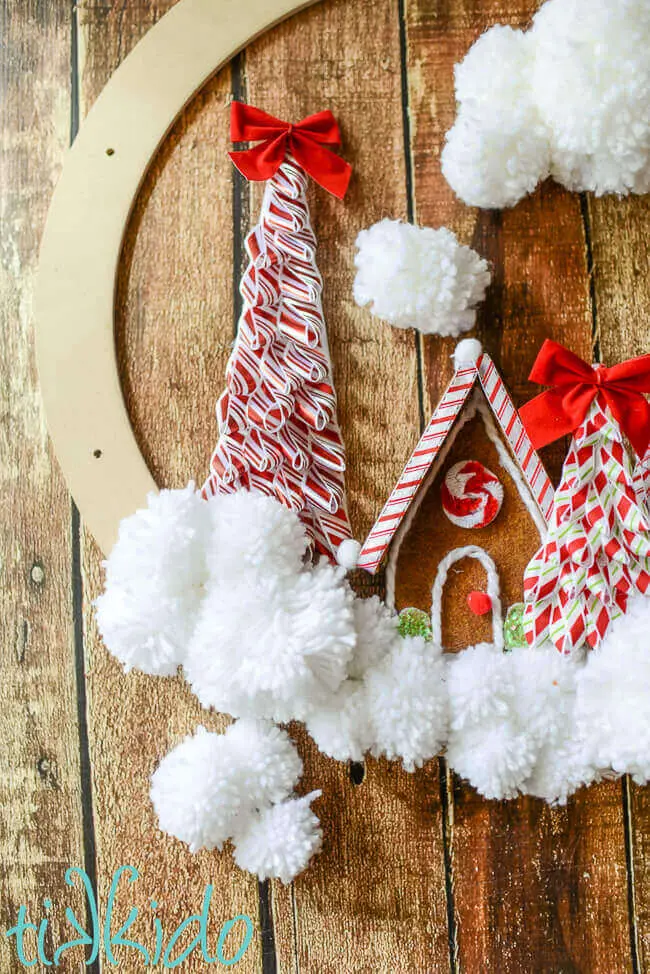 DIY Yarn Pom Pom Christmas Wreath with Felt Gingerbread House