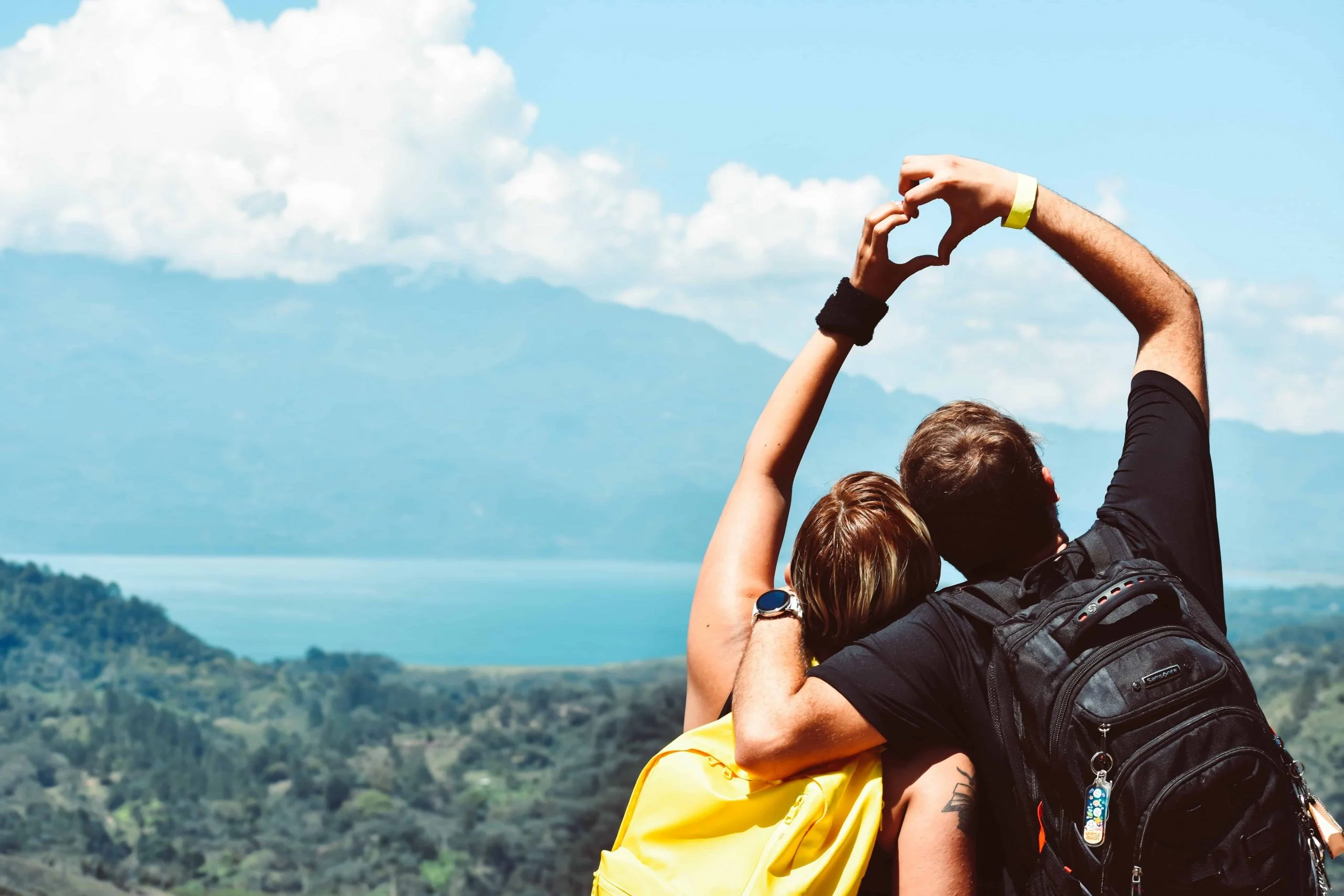 Couple having fun hiking during the summer