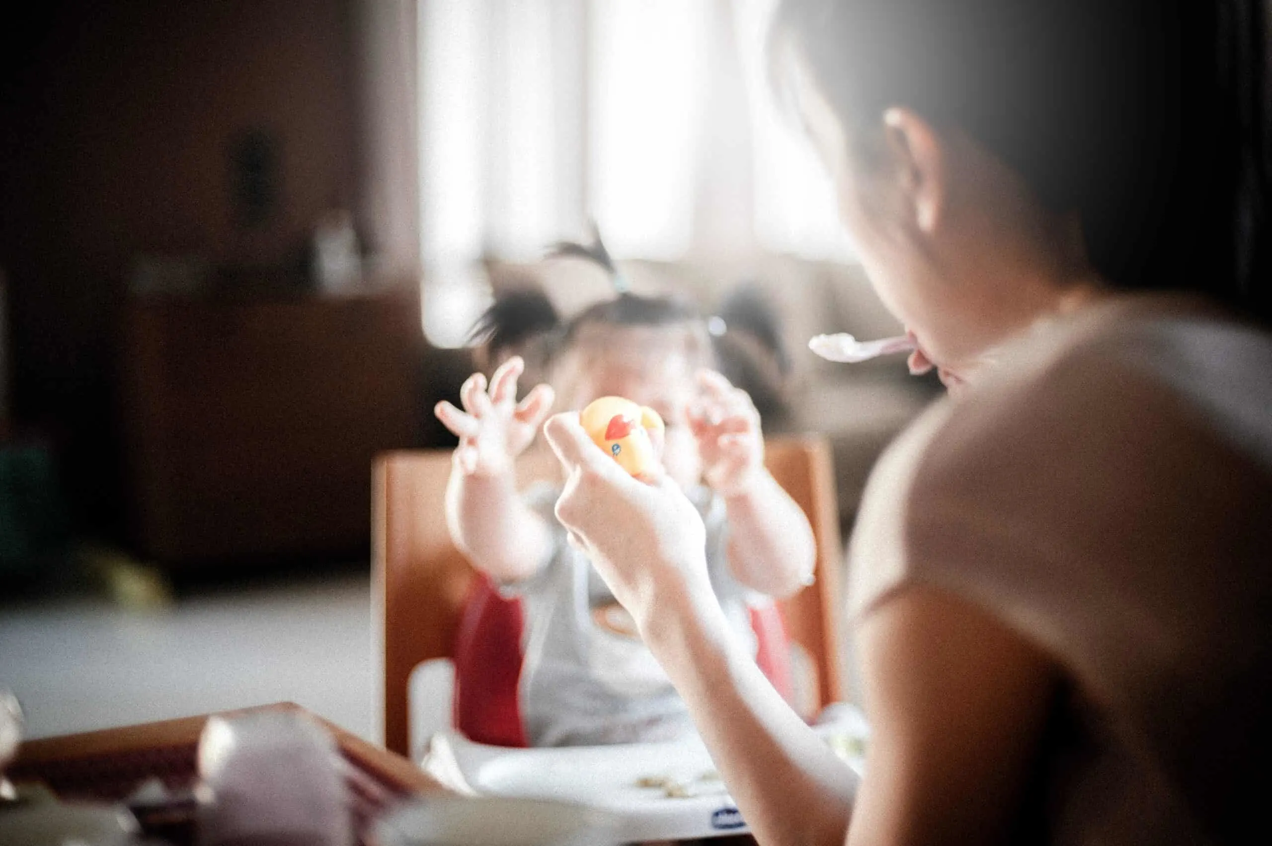 Mom feeding a child