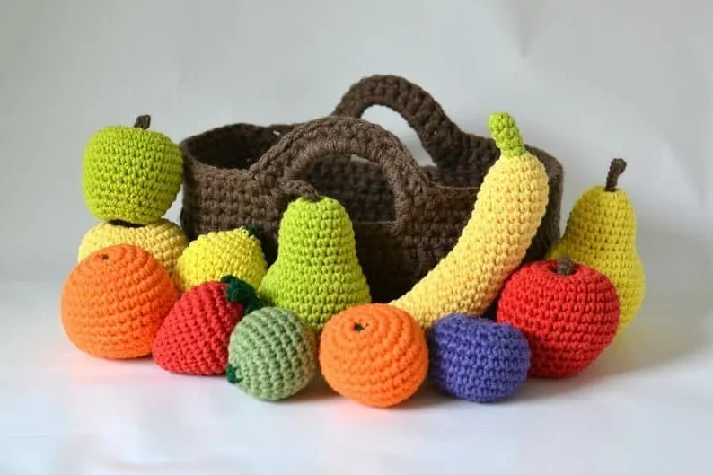 Crocheted play fruit with basket for toddlers